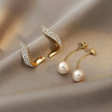 Boucles d'oreilles perle et arc de zircones
