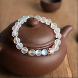 Armband „Vertrauen“ mit Gänseblümchen und Mondstein