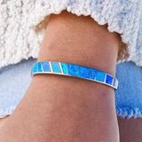 Bracelet opale bleue en or blanc