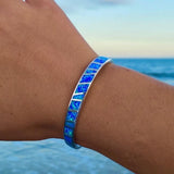Bracelet opale bleue en or blanc