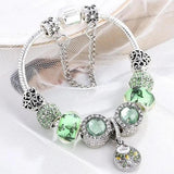 Bracelet en or blanc avec cristal vert