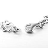 Bracelet à pendentifs pattes de chien et os en or blanc