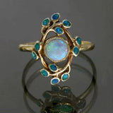 Bague rétro bleue avec cristaux et opale