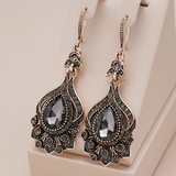 Boucles d'oreilles mandala avec cristal noir | Or