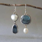 Boucles d'oreilles asymétriques pierres bleues et perle