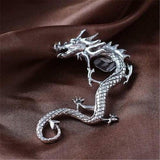 Boucles d'oreilles dragon en or blanc