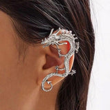Boucles d'oreilles dragon en or blanc
