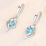 Boucles d'oreilles gouttes « Éclipse » avec cœur | Or blanc