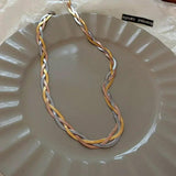 Collier élégant en or et or blanc