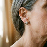 Boucles d'oreilles élégantes à perle noire