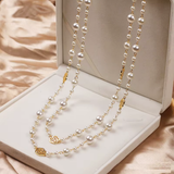 Collier doré élégant à petite perle