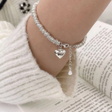 Bracelet élégant avec cœur en or blanc