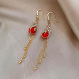 Boucles d'oreilles festives avec pâquerettes