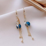 Boucles d'oreilles festives avec pâquerettes