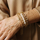 Bracelets dorés avec marguerites