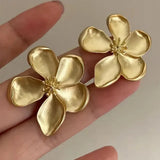 Boucles d'oreilles fleurs dorées