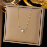 Collier doré avec zircones