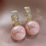 Ohrringe mit rosa Perle und Zirkonia in Gold