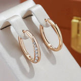 Boucles d'oreilles dorées luxueuses