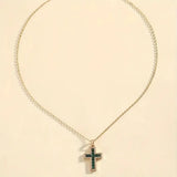 Goldene Kette mit smaragdgrünem Kreuz