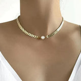 Collier grec avec marguerite en or