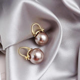 Große Gänseblümchen-Ohrringe in Gold