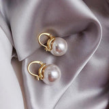 Große Gänseblümchen-Ohrringe in Gold