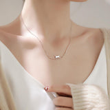 Collier chat grimpeur en or blanc