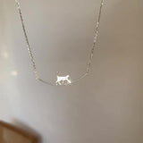Collier chat grimpeur en or blanc