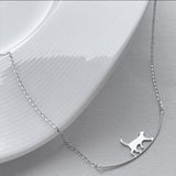 Collier chat grimpeur en or blanc