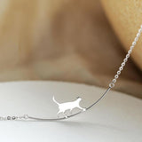 Collier chat grimpeur en or blanc