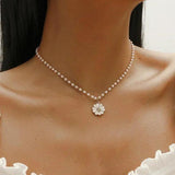 Collier marguerites pendantes