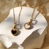 Collier pendentif cœur noir et blanc en or