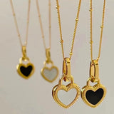 Collier pendentif cœur noir et blanc en or
