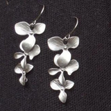 Ensemble : collier et boucles d'oreilles en forme de fleur | Or blanc