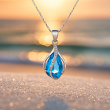 Collier goutte de lumière bleu avec zircones