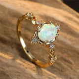 Bague opale aux reflets dorés