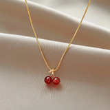 Collier cerises en or
