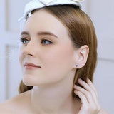 Puces d'oreilles saphir classiques | Or blanc