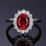 Bague classique rubis avec entourage or blanc