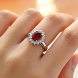 Bague classique rubis avec entourage or blanc