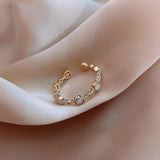 Klassischer verstellbarer Goldring mit Kristall