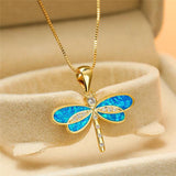 Collier libellule en or avec opale