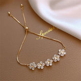 Bracelet marguerite avec cristal en or