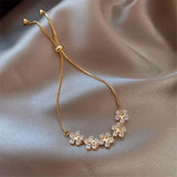 Bracelet marguerite avec cristal en or