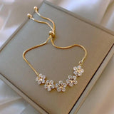 Bracelet marguerite avec cristal en or