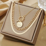 Collier multirangs avec pièces