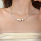 Collier multirangs perles blanches