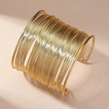 Bracelet ouvert spirale en or