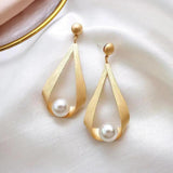 Boucles d'oreilles cristaux et perles rondes
